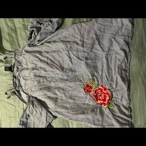short sleeve off the shoulder denim like top. very wrinkled from storage.